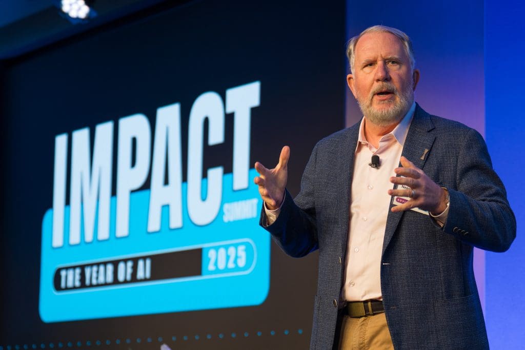Conference speaker on stage at Impact Summit 2025 The Year of AI, Convene San Francisco